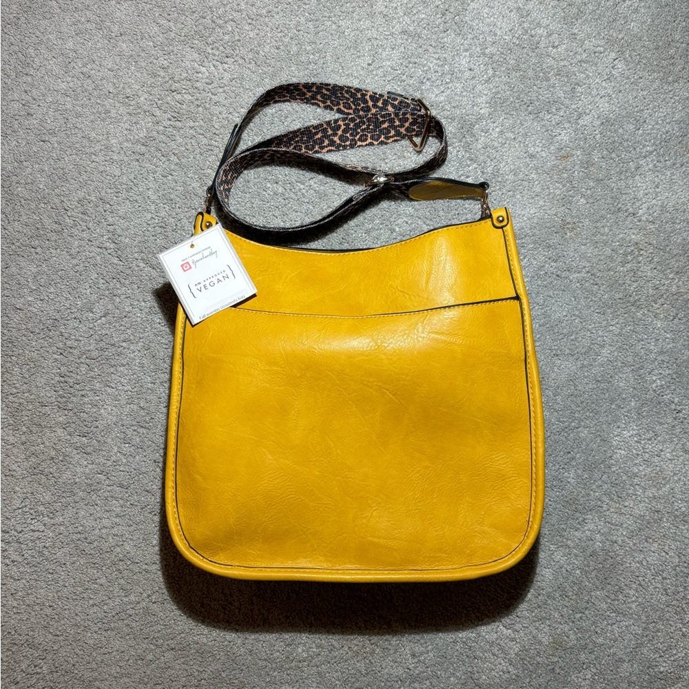 Yellow vegan cross body bag with leopard print strap never used